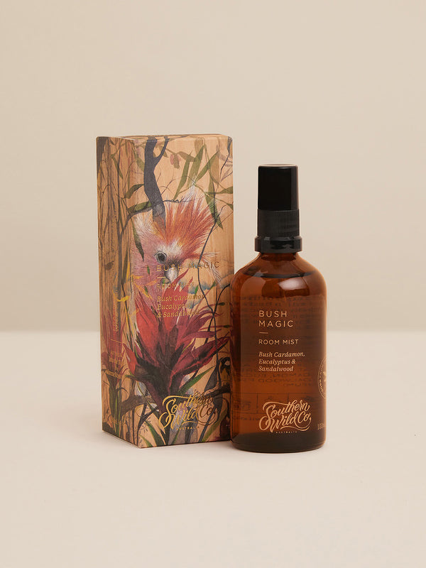 Styled product image of Bush Magic Room Mist with illustrated gift box, showcasing native artwork and the scent’s grounding blend of bush cardamom, eucalyptus and sandalwood.
