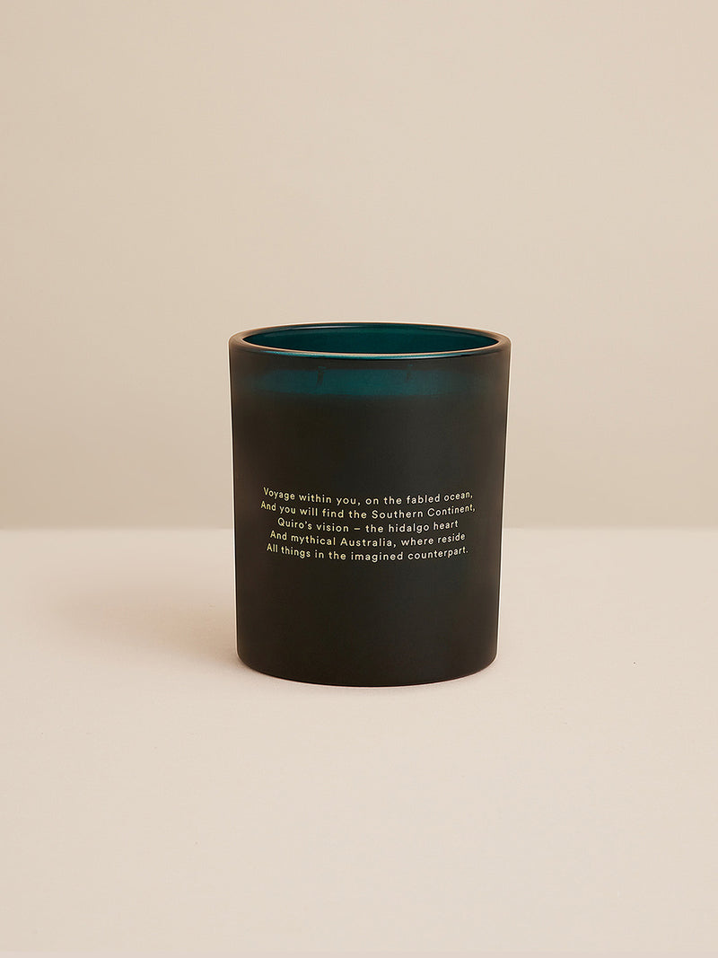 Close-up of Ocean Isle candle with golden verse from James McAuley’s Terra Australis—a poetic homage to imagined seas and mythical Australiana.