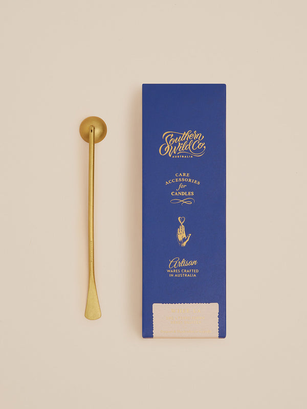 Minimalist brass snuffer with paddle-style tip by Ferro Forma, designed for safe candle extinguishing with slow, reverent ritual.