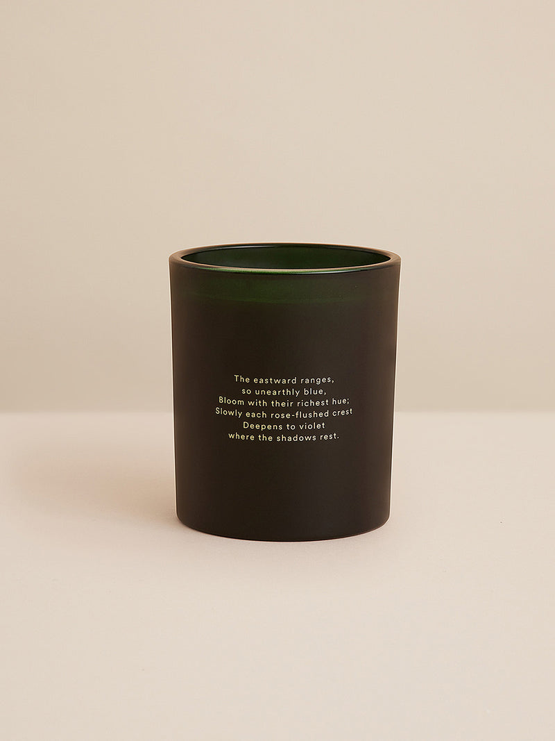 Reverse of Southern Wild Co’s Hidden Vale candle featuring a poem inspired by the Australian landscape – elegant green vessel with nature-inspired verse and artisan design.