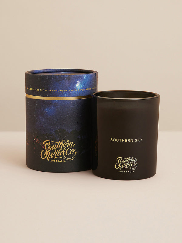 The Southern Sky candle and its star-swept box set against a neutral backdrop—elegant, understated, and grounded in the wonder of Australia’s night skies.
