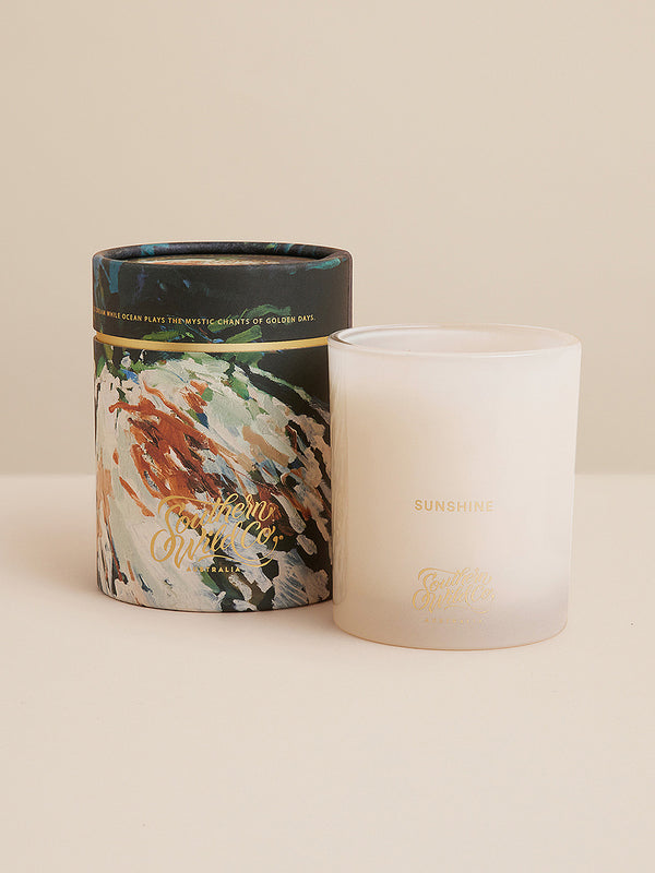 Close-up of the Sunshine candle and its painterly packaging — inspired by summer’s energy, salt air, and golden Australian afternoons.