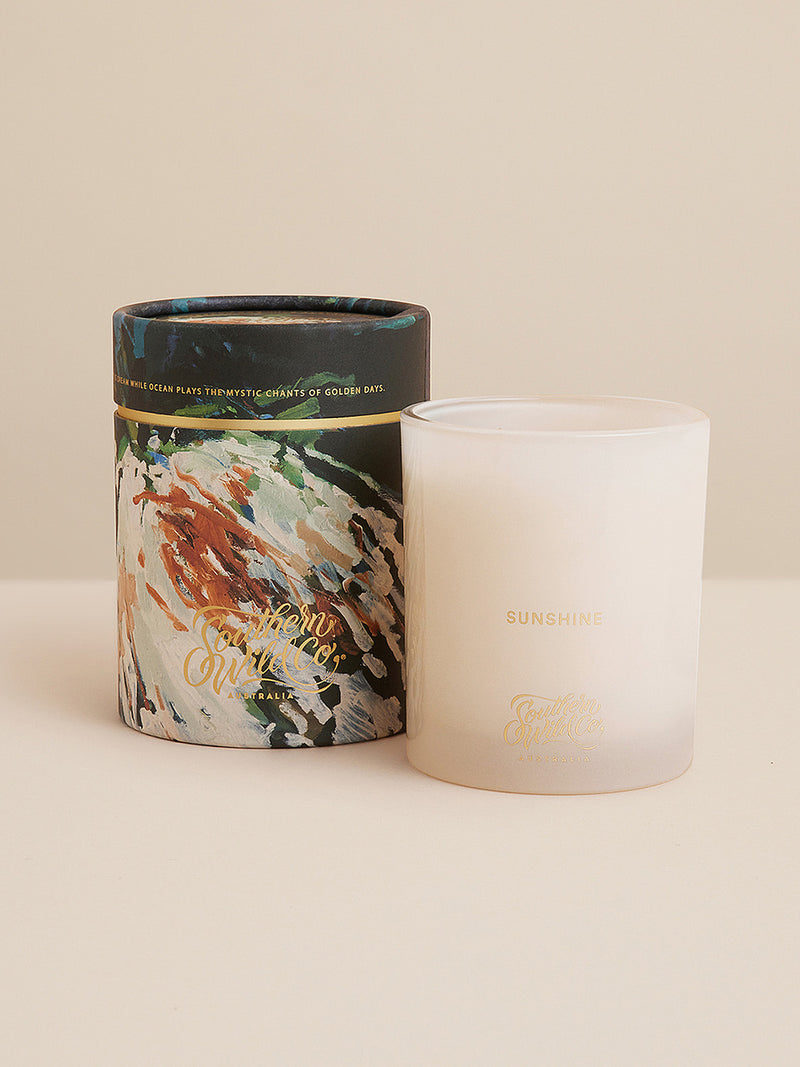 Close-up of the Sunshine candle and its painterly packaging — inspired by summer’s energy, salt air, and golden Australian afternoons.
