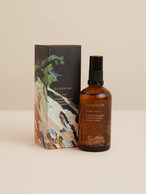 Product image of Sunshine Room Mist with painterly packaging — evoking sun-drenched coastlines and citrus groves, designed to refresh and uplift.